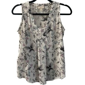 LOFT floral sleeveless blouse with front pleat and flattering Vneck neckline